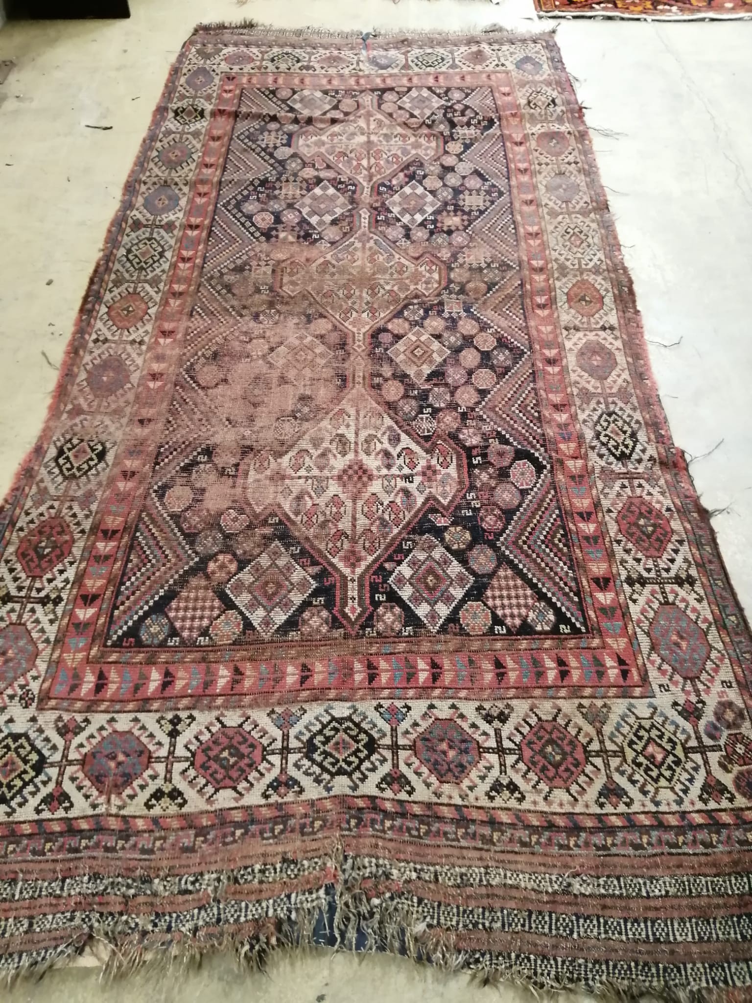 An antique Khamseh rug, 290 x 136cm